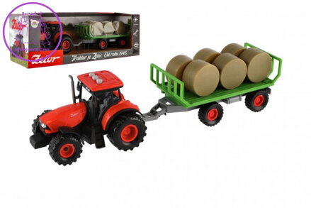 Traktor Zetor s vlekem a balíky plast 36cm na setrvačník na bat. se světlem se zvukem v krab. 39x13